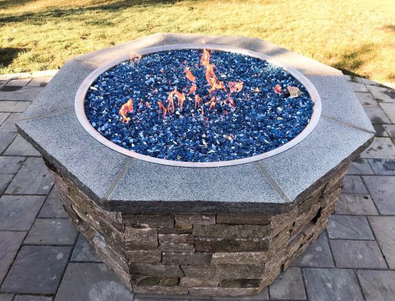 a beautiful stone bonfire pit