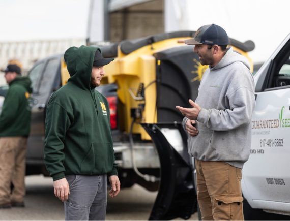 Two Nicholls employees talking